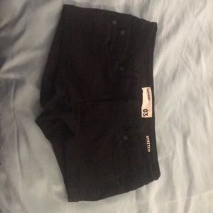 Black “Flirty” jean shorts from Garage